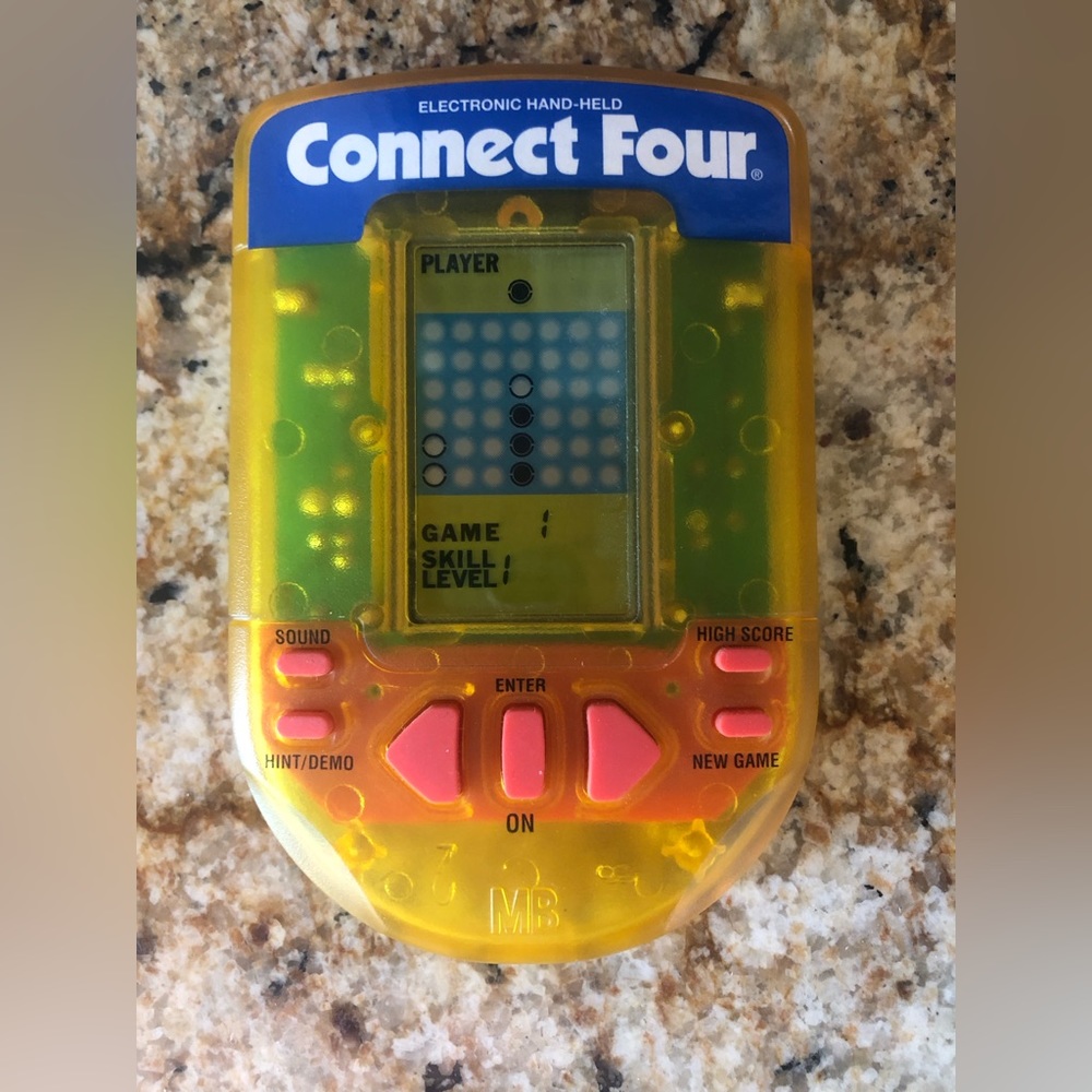Milton Bradley vintage Connect 4 hand held game toy